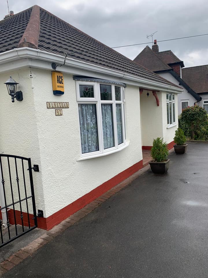 A home looking great after rendering by home improvement experts, Home Fixology.