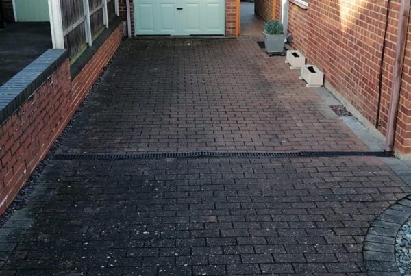 A block paved drive way in need of restoration with Resiblock Driveway Restoration and home improvement experts Home Fixology.
