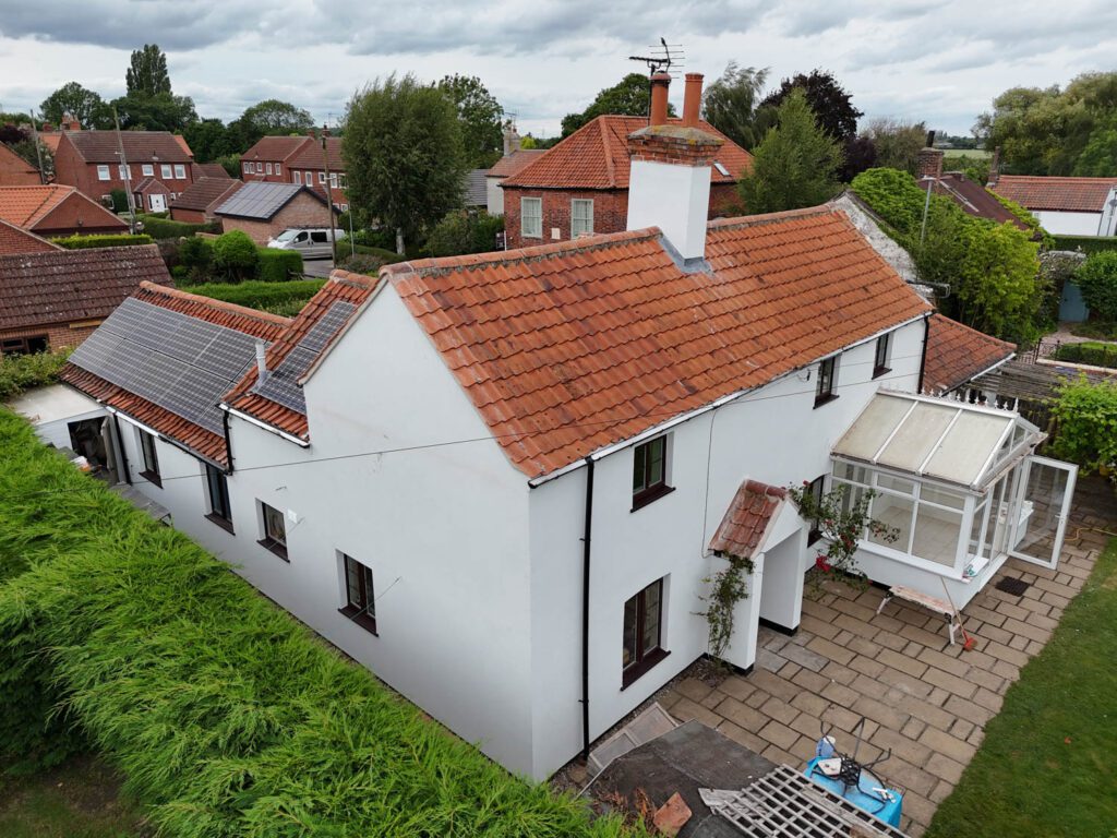 A cottage benefiting from having external wall insulation fitted by Home Fixology.