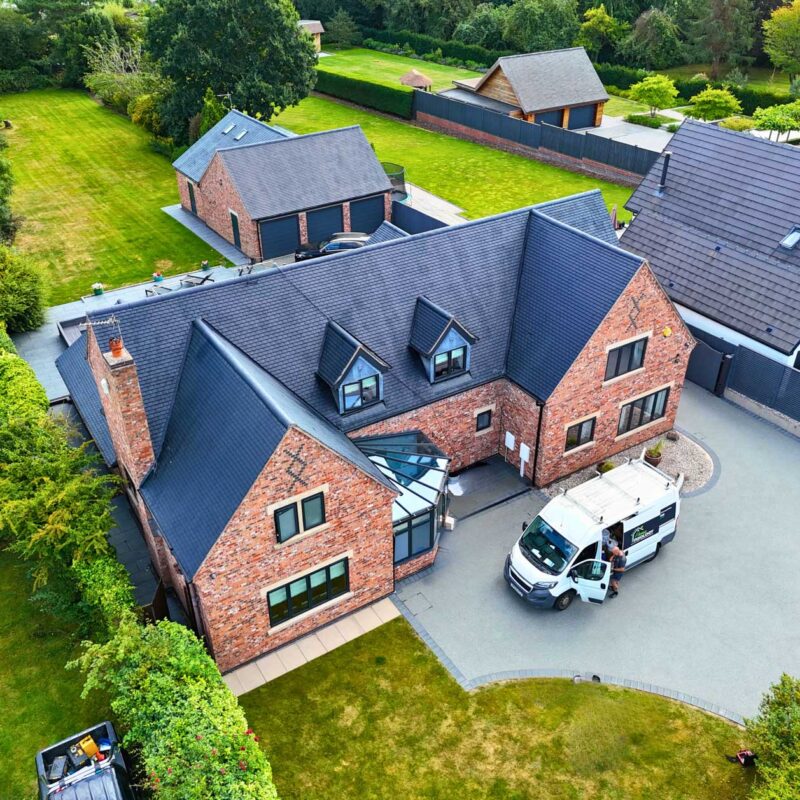 An birds eye view of a very smart home after water repellent coating has been applied to it's roof by Home Fixology.