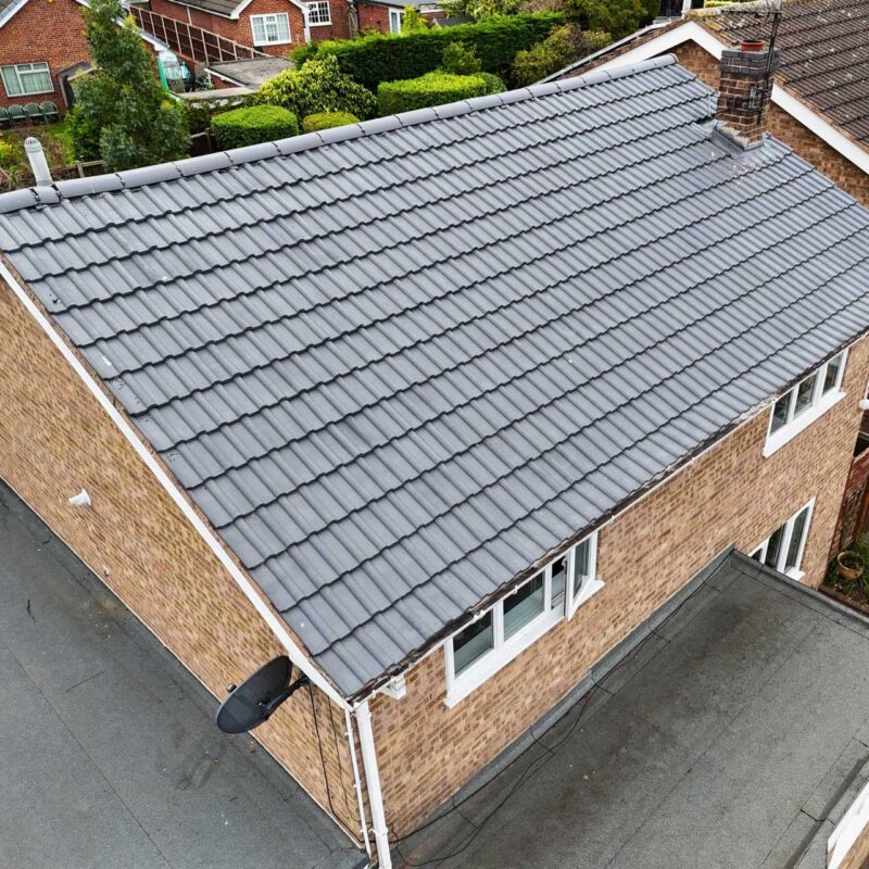 A roof looks great and is now protected after a roof coating was applied by Home Fixology.