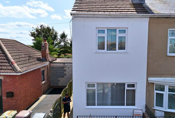 Front of a home that has external wall insulation this will help with damp prevention.